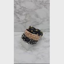 Load and play video in Gallery viewer, FAUX LEATHER KNOTTED HEADBAND, PEARL OR GOLD HEART EMBELLISHMENT, BLACK BEIGE HAIR ACCESSORY
